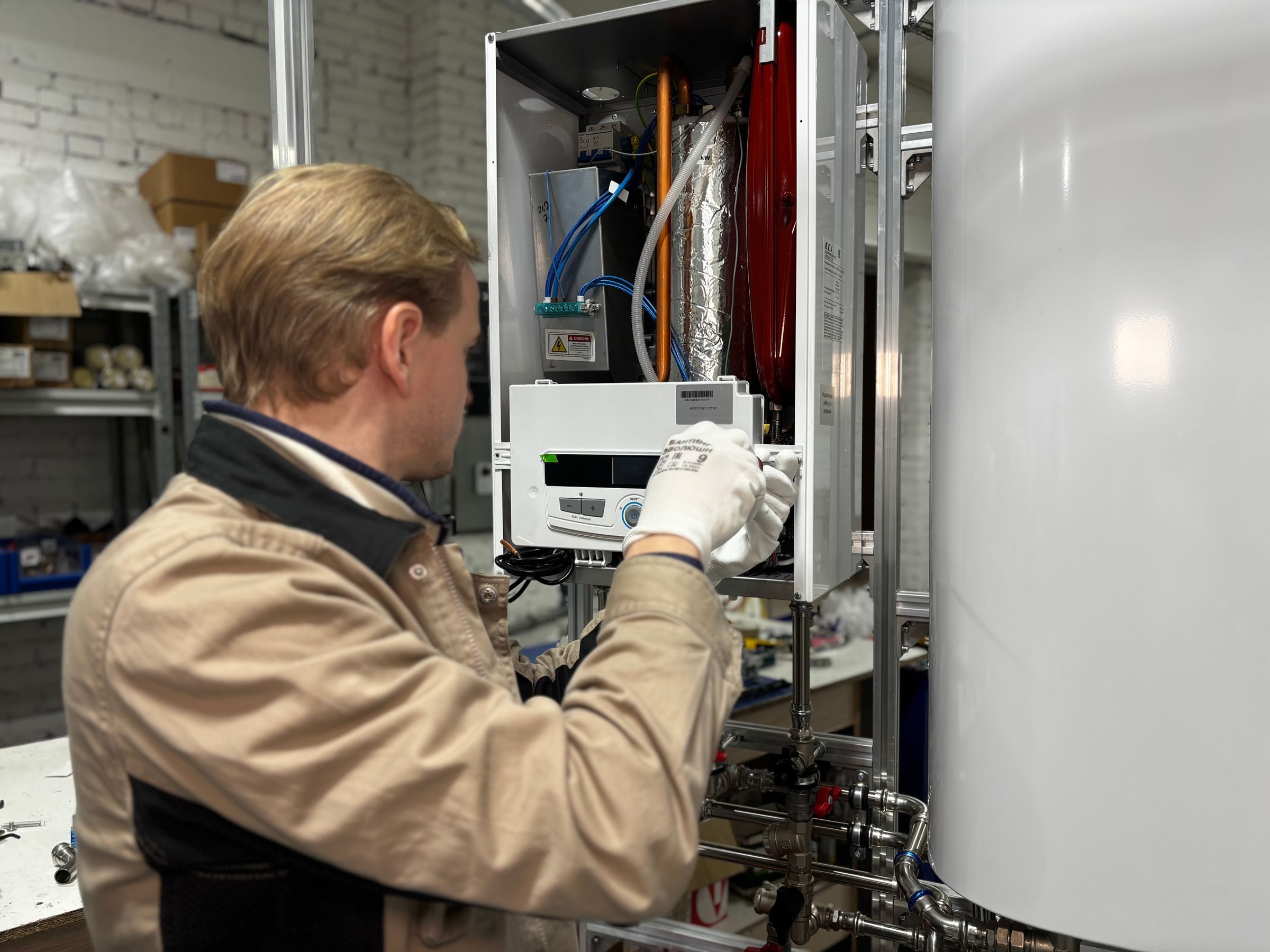 Technician servicing a heating system